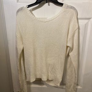 Exposed back V shaped sweater